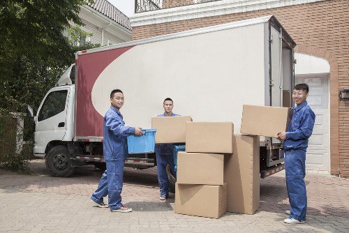 Man with van team preparing items safely before loading